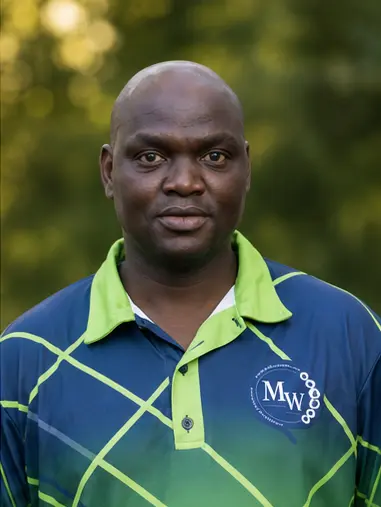 MetsonWorld Logistics driver in a branded blue and green shirt